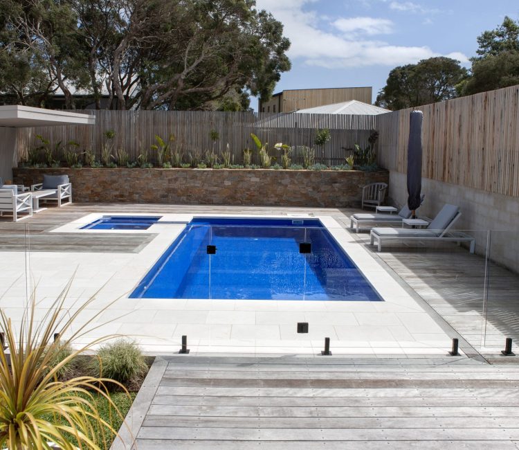 Fibreglass pool and spa combination by Master Pools in Melbourne with integrated spa and spillway